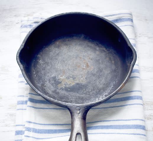 © Sawayasu Tsuji / Getty Images Cast-Iron Skillet in Need of Cleaning and Seasoning