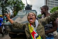 Many in the crowds were cheering the soldiers and stopping to shake their hands