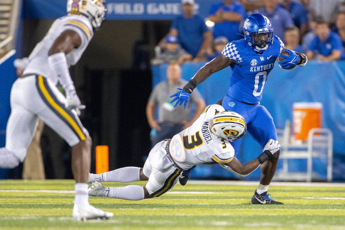 Missouri’s Martez Manuel (3) tried to bring down Kentucky running back Kavosiey Smoke (0) in UK’s 35-28 win over Mizzou last season at Kroger Field. Manuel said this past summer he considers UK to be Missouri’s foremost SEC rival. “I hate that white and blue, I’m not going to lie to you,” Manuel said.