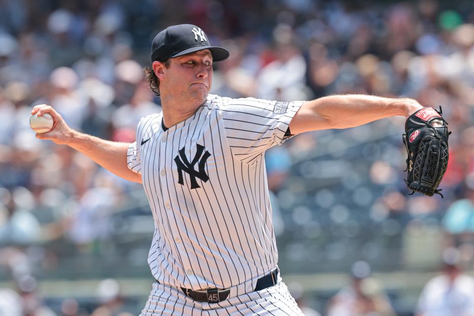 New York Yankees starting pitcher Gerrit Cole (45) delivers a pitch during the first inning against the Boston Red Sox.