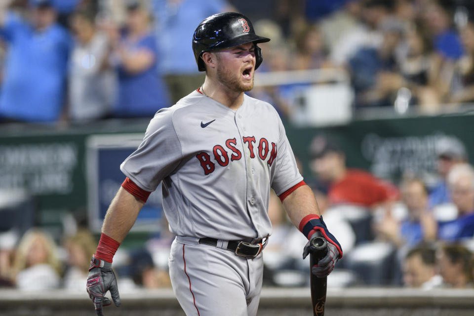 Boston Red Sox's Christian Arroyo is thrown out of a baseball game for arguing with the umpire after being called out on strikes during the ninth inning against the Kansas City Royals in Kansas City, Mo., Friday, June 18, 2021. (AP Photo/Reed Hoffmann)