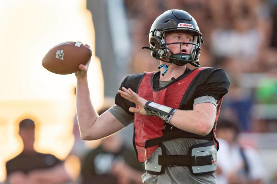 Twelve Bridges High School quarterback Whit Kruse throws the ball during a scrimmage at Twelve Bridges High School on Friday, Aug. 11, 2023, in Lincoln.