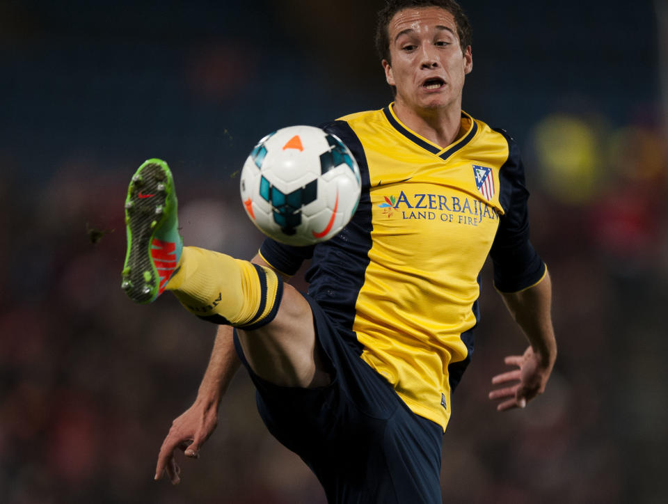 Atletico's Javier Manquillo in action during a Spanish La Liga soccer match between Almeria and Atletico de Madrid at the Juegos Mediterraneos stadium in Almeria, Spain Saturday Feb. 8, 2014. (AP Photo/Daniel Tejedor)