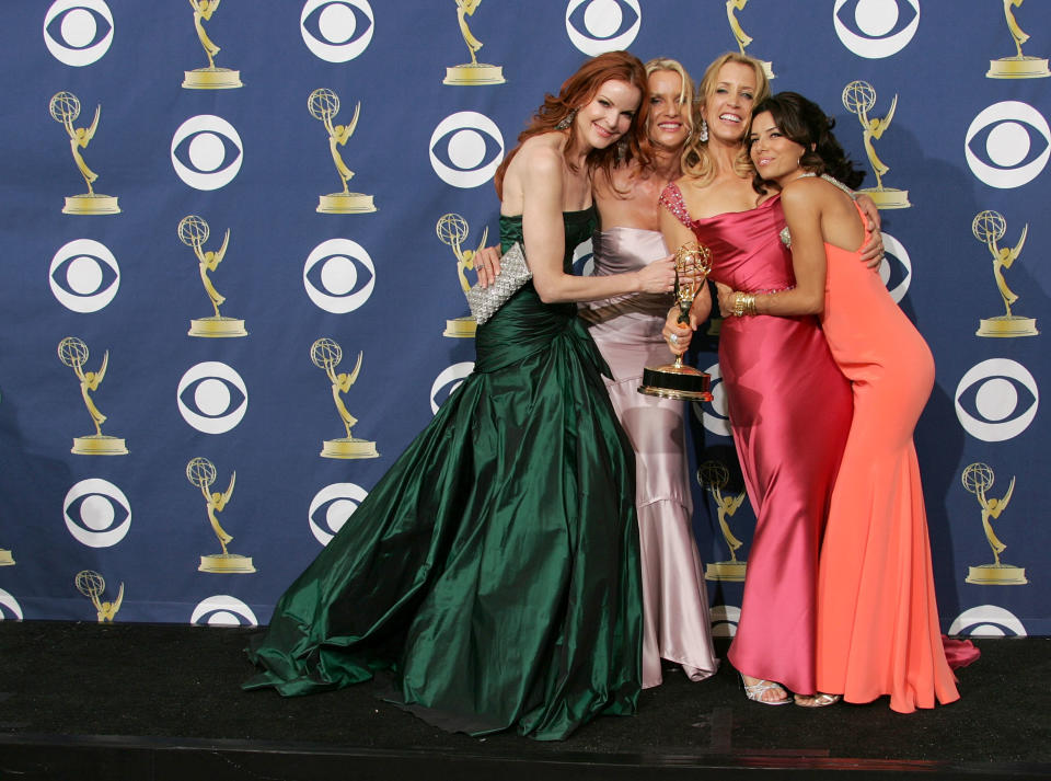 The women of <em>Desperate Housewives</em> pose in the press room at the 57th Annual Emmy Awards in 2005. [Photo: Getty Images]