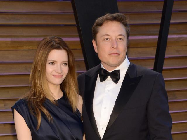 Elon Musk's ex-wife told his biographer that deep inside the Tesla CEO 'is  this manchild still standing in front of his father'