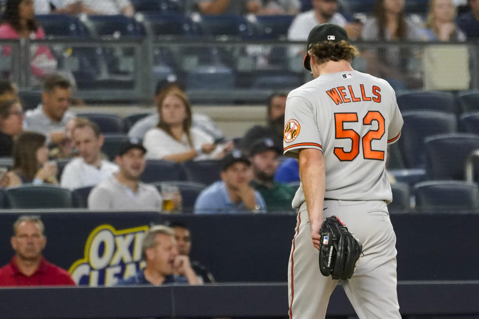 Baltimore Orioles pitcher Alexander Wells leaves the field after being removed during the third inning of the team's baseball game against the New York Yankees, Tuesday, Aug. 3, 2021, in New York. (AP Photo/Mary Altaffer)