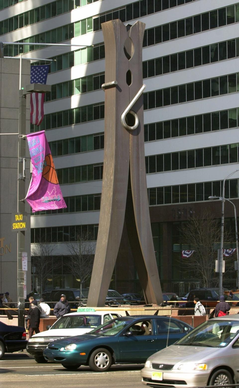 FILE - Pop artist Claes Oldenburg's "Clothespin" sculpture is displayed in the Center City section of Philadelphia on Friday, March 1, 2002. Oldenburg died Monday, July 18, 2022, in Manhattan, according to his daughter, Maartje Oldenburg. He had been in poor health since falling and breaking his hip a month ago. He was 93. (AP Photo/Dan Loh, File)