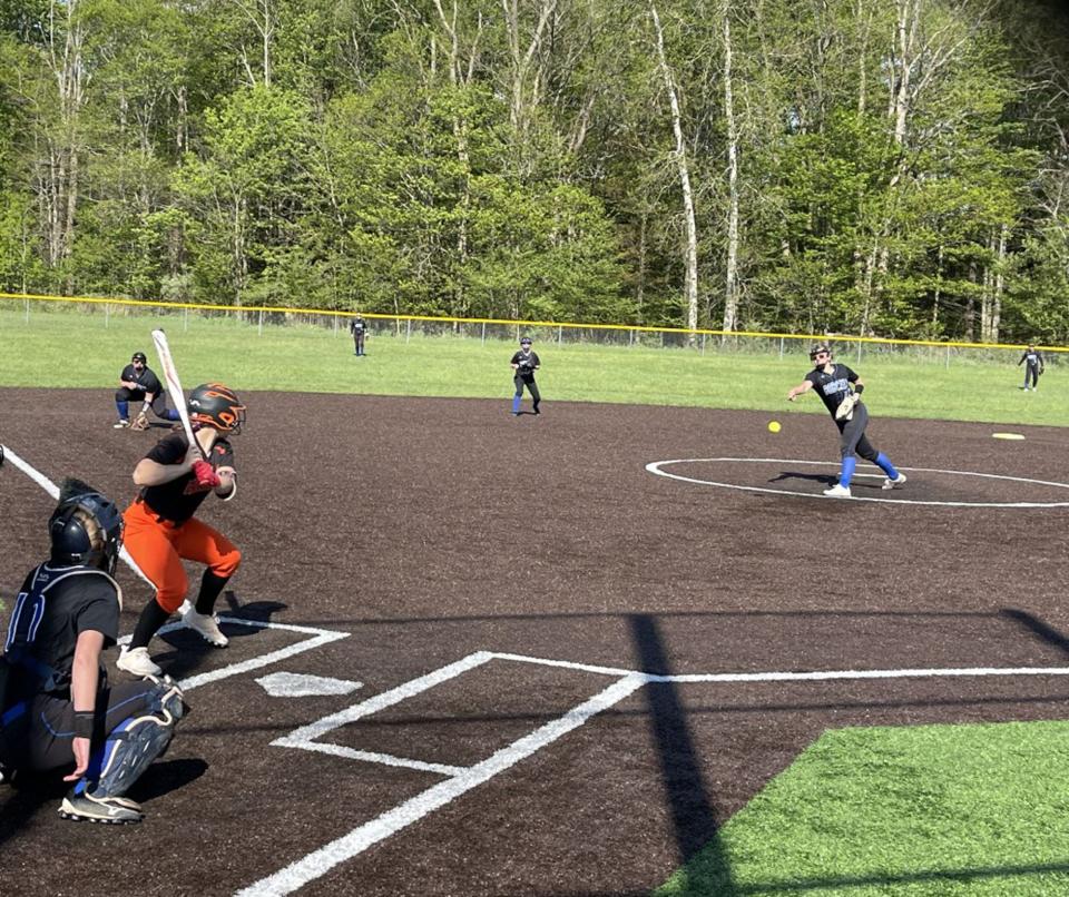 Seneca's Lauren Konkol pitches to Harbor Creek's Reagan Rand on Monday at Seneca High School's field. Seneca won 8-7.