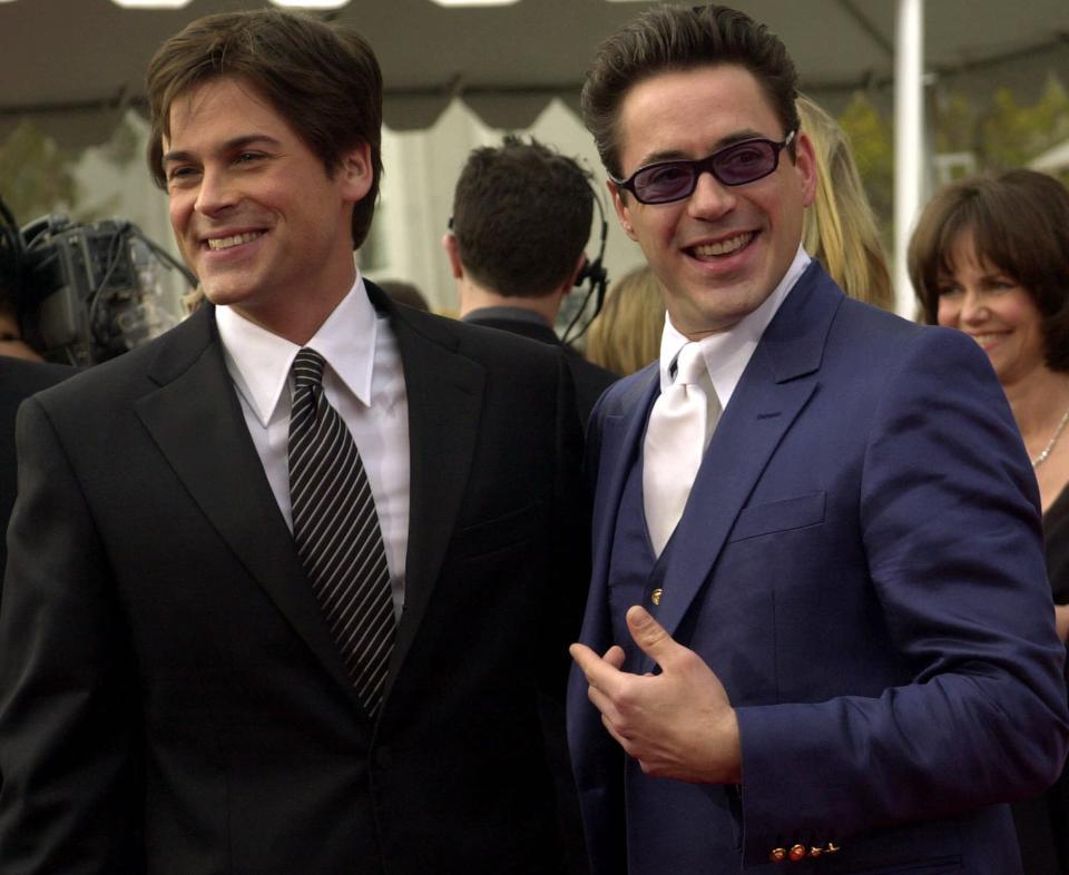 Rob Lowe and Robert Downey, Jr. arrive at the 7th annual Screen Actors Guild Awards, Sunday, March 11, 2001, in Los Angeles. Lowe is nominated for his role in "The West Wing" and Downey is  nominated for his role in "Ally McBeal." (AP Photo/Kevork Djansezian)