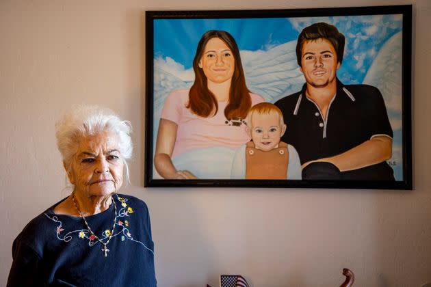 Donna Casasanta with a painting showing her late son, Harold Dean Clouse, with his wife, Tina Gail Linn, and their daughter, Holly Marie Clouse, at Casasanta's Florida home in January. (Photo: Associated Press)