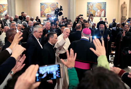 Pope Francis waves as he arrives at Saint Peter's Cathedral in Rabat, Morocco, March 31, 2019. REUTERS/Youssef Boudlal