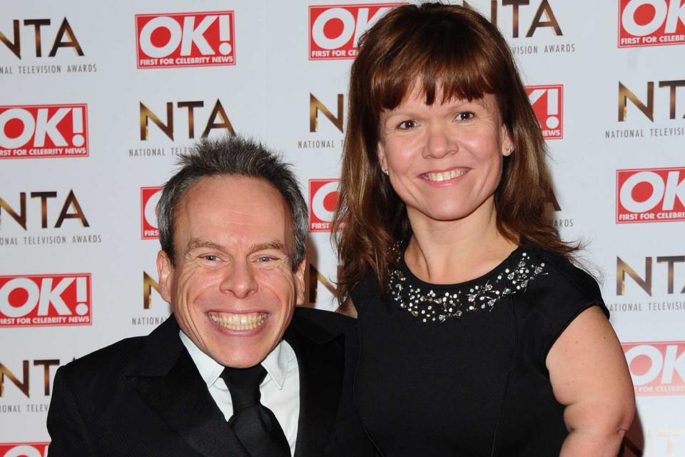 <p>Stuart Wilson/FilmMagic</p> Warwick Davis and Samantha Davis