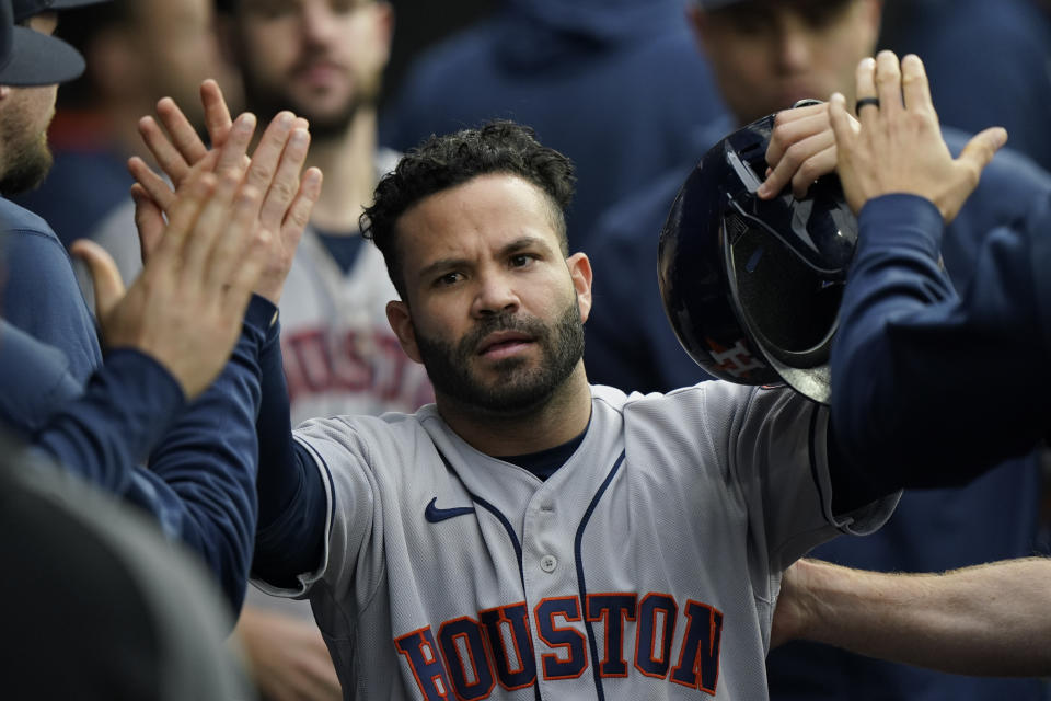 Houston Astros' Jose Altuve celebrates scoring against the Chicago White Sox in the eighth inning during Game 4 of a baseball American League Division Series Tuesday, Oct. 12, 2021, in Chicago. (AP Photo/Nam Y. Huh)