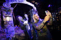 <p>taking selfies with some ghouls at Freeform's 2021 Halloween Road event in celebration of "31 Nights of Halloween" in L.A. on Oct. 1.</p>