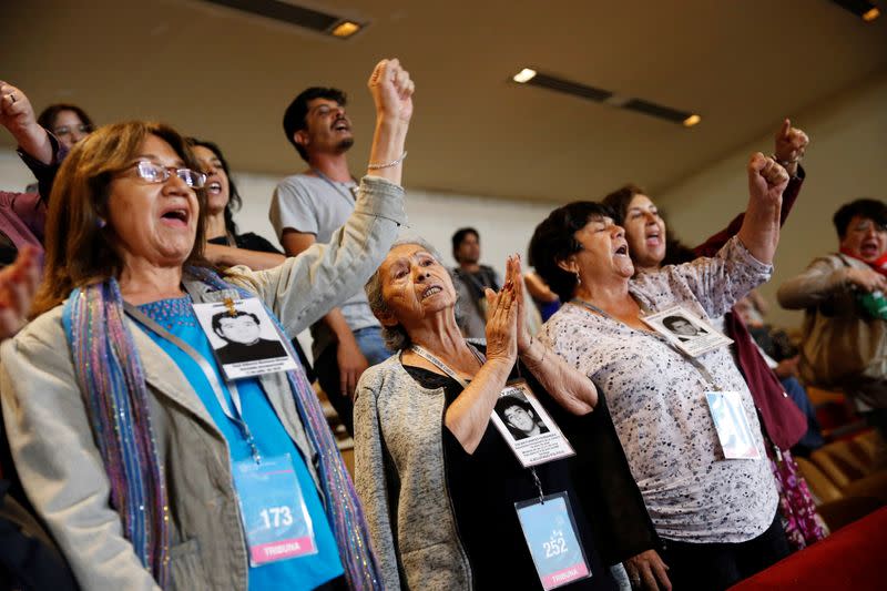 Demonstrators opposing the government shout slogans after the lawmakers rejected a move to impeach President Sebastian Pinera during a session at the congress in Valparaiso