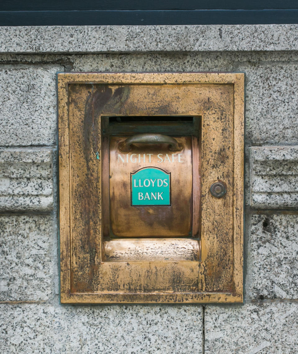 The disused night safe bearing the Lloyds Bank name is still on the wall of the building (SWNS.com)