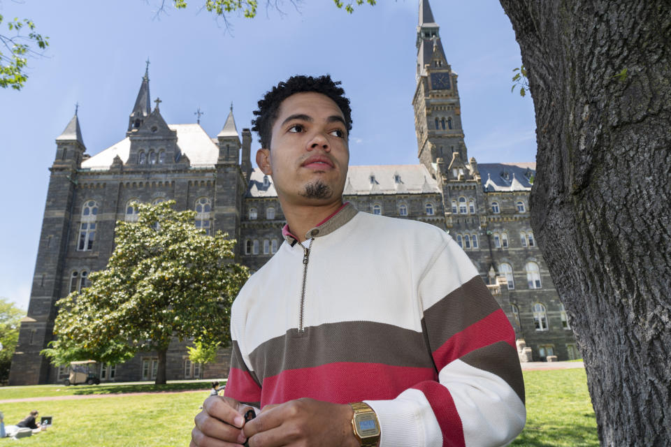 Shepard Thomas, a recent Georgetown University graduate and a descendant of slaves sold by Jesuits to keep the school open, poses for a portrait on the campus in Washington on Thursday, May 6, 2021. One of the main concerns is how funds committed to reparations work will be spent, and whether slave descendants will have adequate say in the process, according to Thomas. “The fear is that the university will use these funds for their own purposes,” the 23-year-old New Orleans native said. “The university is trying to control the narrative, and we’re trying to prevent that.” (AP Photo/Jacquelyn Martin)