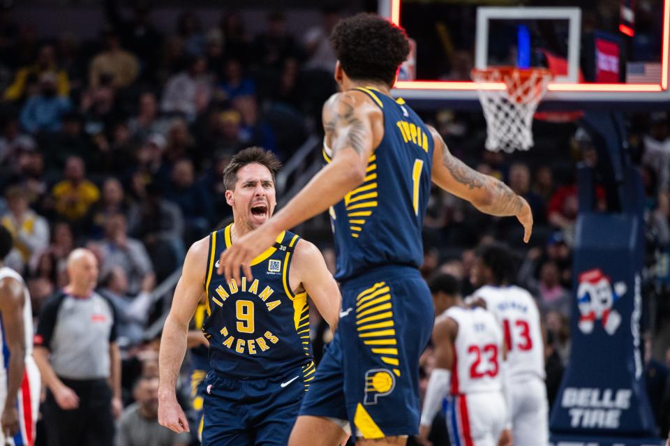 Feb 22, 2024; Indianapolis, Indiana, USA; Indiana Pacers guard T.J. McConnell (9) and forward Obi Toppin (1) celebrate in the first half against the Detroit Pistons at Gainbridge Fieldhouse. Mandatory Credit: Trevor Ruszkowski-USA TODAY Sports