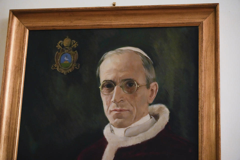 A painting of Pope Pius II hangs on a wall of the Gregorian University in Rome, Monday, Oct. 9, 2023. The Gregorian University is hosting the international conference "New documents from the Pontificate of Pope Pius XII and their Meaning for Jewish-Christian Relations: A Dialogue Between Historians and Theologians". (AP Photo/Gregorio Borgia)