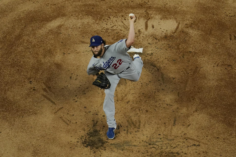 Los Angeles Dodgers starting pitcher Clayton Kershaw throws against the Tampa Bay Rays during the first inning in Game 5 of the baseball World Series Sunday, Oct. 25, 2020, in Arlington, Texas. (AP Photo/David J. Phillip)