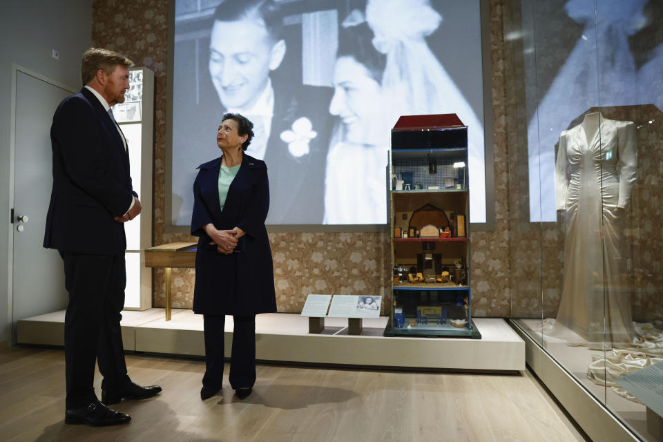 Netherlands' King Willem Alexander, left, tours the National Holocaust Museum in Amsterdam, Netherlands, Sunday, March 10, 2024. The Netherlands's National Holocaust Museum is opening on Sunday in a ceremony presided over by the Dutch king as well as Israeli President Isaac Herzog, whose presence is prompting protest because of Israel's deadly offensive against Palestinians in Gaza. (Piroschka van de Wouw/Pool Photo via AP)