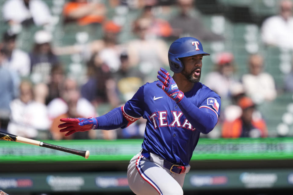 Texas Rangers' Marcus Semien connects for a RBI single to center during the fifth inning of a baseball game against the Detroit Tigers, Tuesday, April 16, 2024, in Detroit. (AP Photo/Carlos Osorio)
