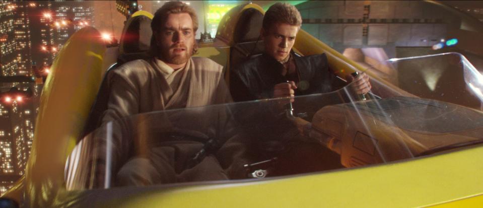 Obi-Wan Kenobi (Ewan McGregor) and Anakin Skywalker (Hayden Christensen) chase a bounty hunter in "Attack of the Clones."