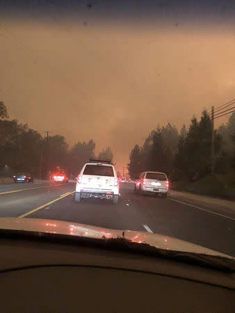 Vehicles are seen during evacuation from Paradise to Chico, in Butte County, California, U.S. in this November 8, 2018 picture obtained from social media. @dlmadethecut/via REUTERS