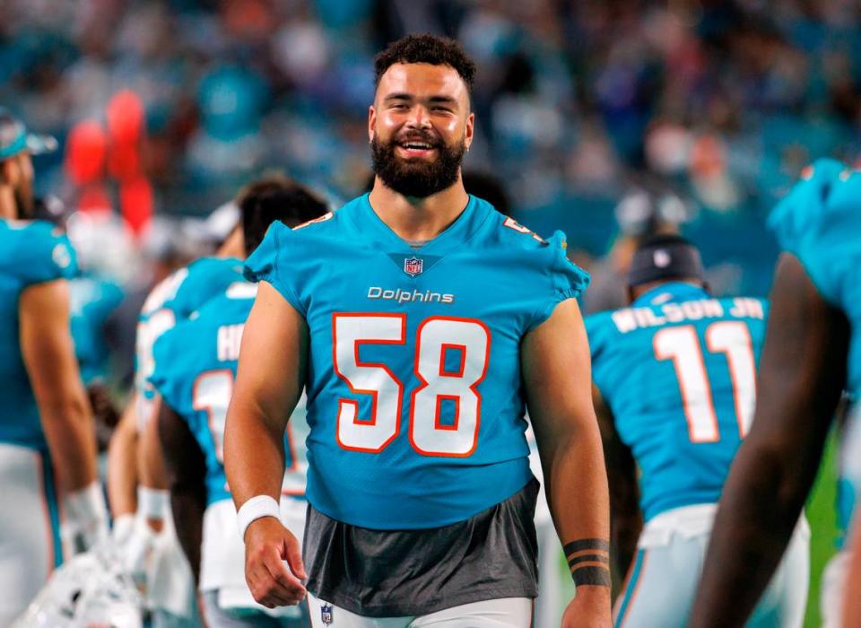 Miami Dolphins center Connor Williams (58) looks from the sidelines during third quarter of an NFL preseason football game against the Las Vegas Raiders at Hard Rock Stadium on Saturday, August 20, 2022 in Miami Gardens, Florida.