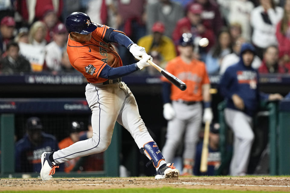 Houston Astros' Jeremy Pena hits a home run during the fourth inning in Game 5 of baseball's World Series between the Houston Astros and the Philadelphia Phillies on Thursday, Nov. 3, 2022, in Philadelphia. (AP Photo/David J. Phillip)