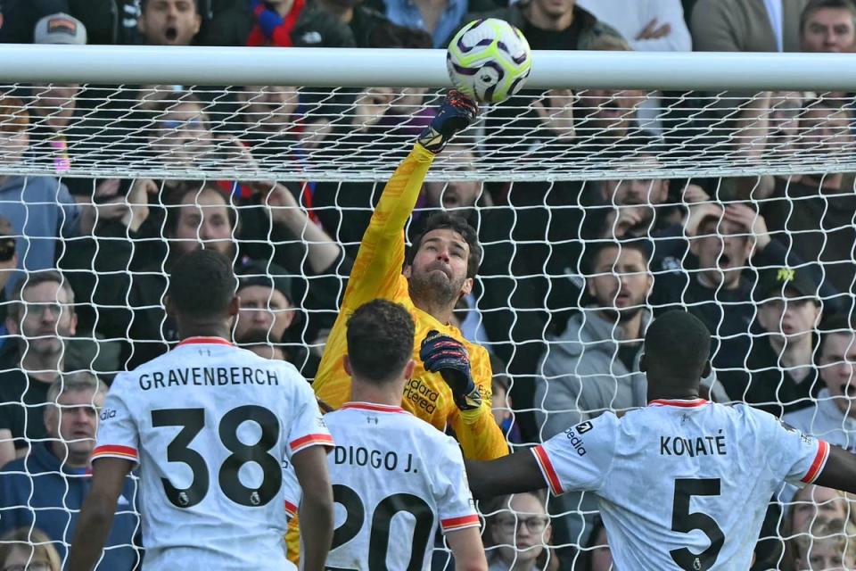 Liverpool’s Brazilian goalkeeper Alisson Becker was injured against Crystal Palace  (AFP via Getty Images)