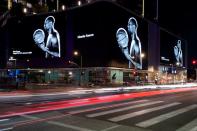 The street son L.A. are lit up with images of NBA basketball star Kobe Bryant as fans pay their respects outside the Staples Center in Los Angeles