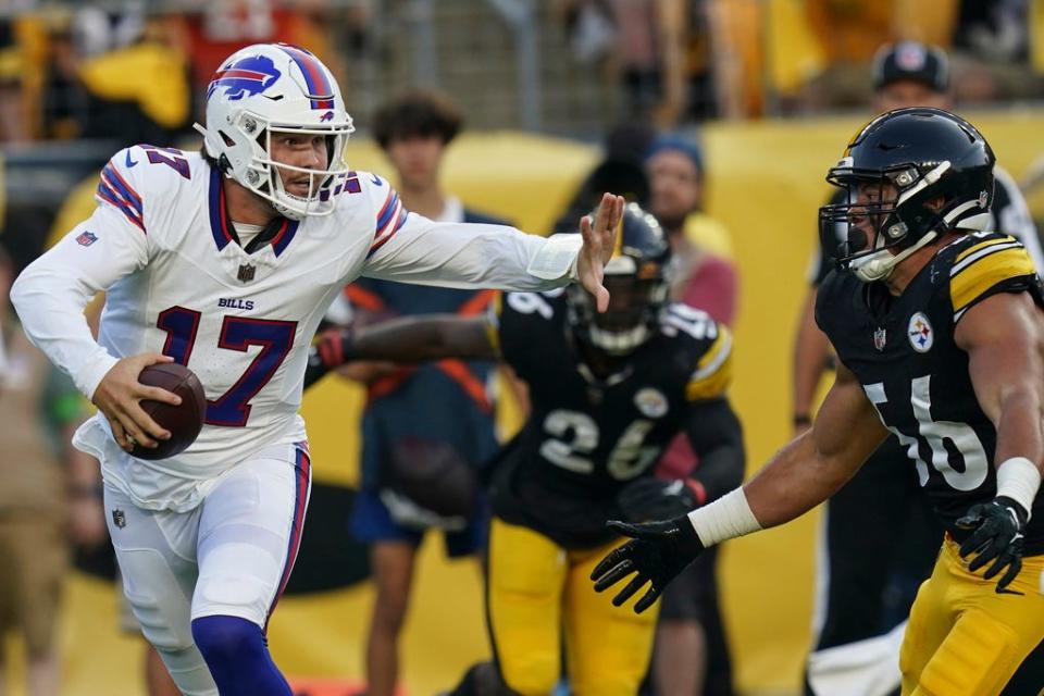 Buffalo Bills quarterback Josh Allen (17) looks to pass in the first half of an NFL preseason football game against the Pittsburgh Steelers.