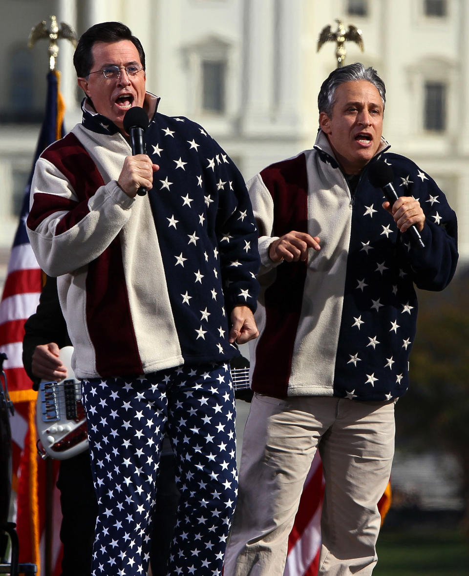 WASHINGTON - OCTOBER 30:  Comedians Steven Colbert (L) and Jon Stewart perform at the Rally To Restore Sanity And/Or Fear on the National Mall on October 30, 2010 in Washington, DC. Stewart and Colbert held the rally, which tens of thousands of people attended.  (Photo by Win McNamee/Getty Images)