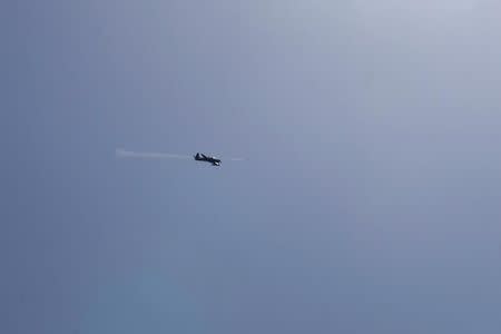 An Afghan Air Force A-29 attack aircraft fires a rocket during an exercise at a bombing range outside Kabul, Afghanistan October 18, 2016. REUTERS/Josh Smith