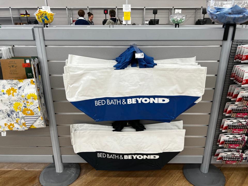 Reusable shopping bags on sale at a Bed Bath & Beyond store