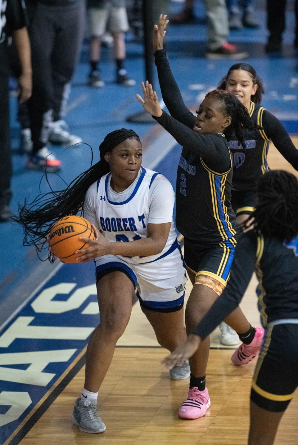 Mikerria Bonner (31) looks to pass during the Mainland vs Washington girls 5A Regional Finals basketball game at Booker T. Washington High School in Pensacola on Thursday, Feb. 22, 2024.