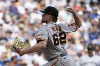 San Francisco Giants starting pitcher Logan Webb throws during the third inning of a baseball game against the Milwaukee Brewers Saturday, May 27, 2023, in Milwaukee. (AP Photo/Morry Gash)