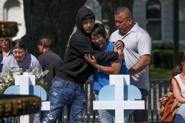 Mourners grieve the 19 children and two adults who were killed at Robb Elementary. (Photo: Anadolu Agency via Getty Images)