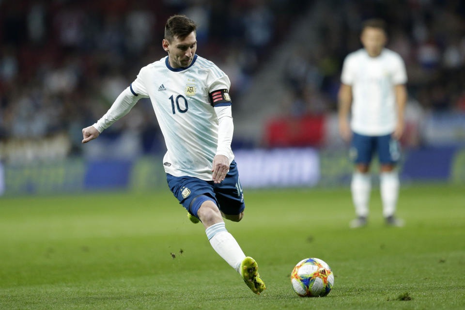 Argentina's Lionel Messi runs with the ball during an international friendly soccer match between Argentina and Venezuela at Wanda Metropolitano stadium in Madrid, Spain, Friday, March 22, 2019. (AP Photo/Bernat Armangue)