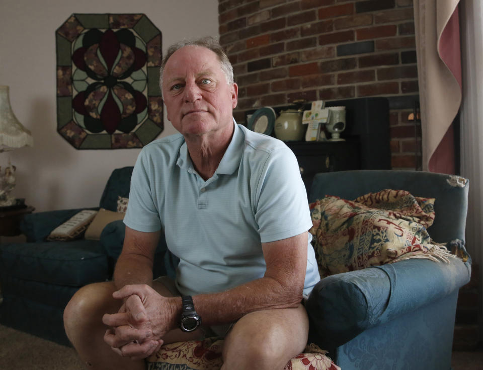 In this Saturday, July 27, 2019 photo, retired nurse Tim Thomas, who assisted in a surgery in the parking lot of Watsonville Community Hospital after the facility lost power following the 1989 Loma Prieta earthquake, poses during his visit to Lodi, Calif. California hospitals are asking lawmakers to scale back earthquake standards because they cost too much and might not be needed. Talk of scaling back the standards upsets Thomas, who was thrown to the floor during the earthquake. "To not make provisions to have the hospitals keep pace with the rest of the infrastructure doesn't make any sense to me" says Thomas. (AP Photo/Rich Pedroncelli)