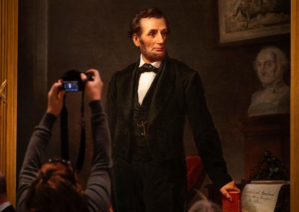 The life-size painting of President Abraham Lincoln by artist W.F.K. Travers created in 1865 is unveiled at the National Portrait Gallery in Washington, D.C. on Friday, February 10, 2023. The 9-foot-tall oil on canvas is one of three known, life-size paintings of the 16th president. The historic work comes to the National Portrait Gallery on a long-term loan from the Hartley Dodge Foundation, whose founder, Geraldine Rockefeller Dodge, acquired the painting from her family in the 1930s.