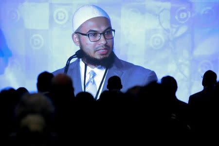 Imam Abdullah Jaber says the opening prayer at the Democratic National Committee winter meeting in Atlanta, Georgia, February 25, 2017. REUTERS/Chris Berry