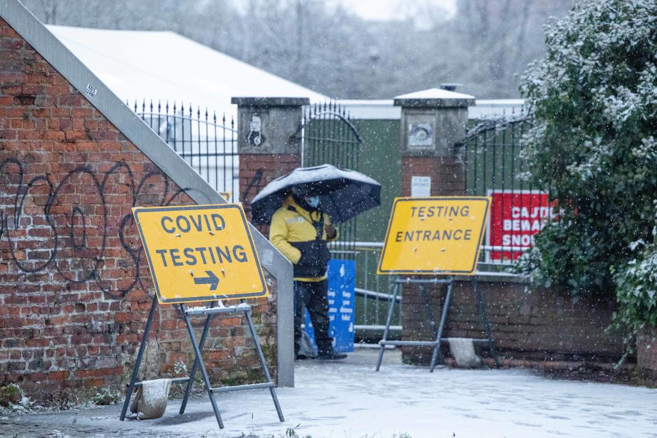 A COVID-19 testing centre continues to operate in Ancoats, Manchester city centre, as snow hits the UK. Tuesday 29th December 2020.  (Photo by Pat Scaasi/MI News/NurPhoto via Getty Images)