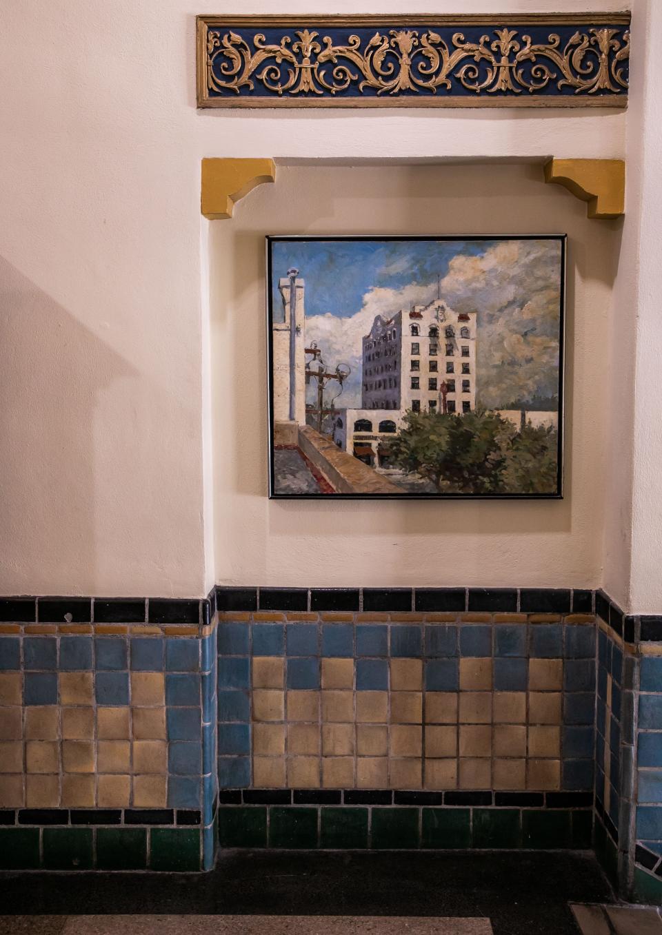 A painting of the Marion Sovereign building in Spanish Colonial Revival architectural style, hangs on the wall near the elevators Tuesday afternoon.