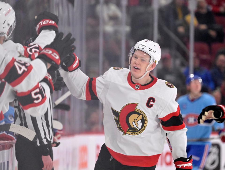 Jan 31, 2023; Montreal, Quebec, CAN; Ottawa Senators forward Brady Tkachuk (7) celebrates with teammates after scoring a goal against the Montreal Canadiens during the third period at the Bell Centre. Mandatory Credit: Eric Bolte-USA TODAY Sports