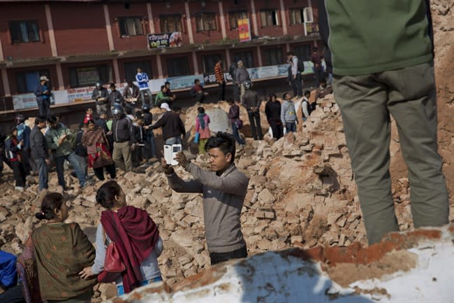 A man takes a selfie at the historic Dharahara Tower. (AP Photo/Bernat Armangue)