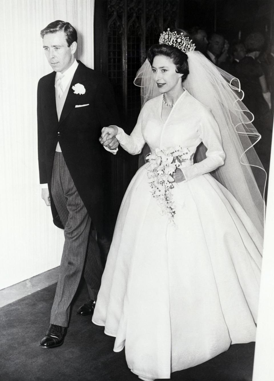 <p>Princess Margaret and her new husband Antony Armstrong-Jones leave Westminister Abbey after their wedding on May 6, 1960.</p>