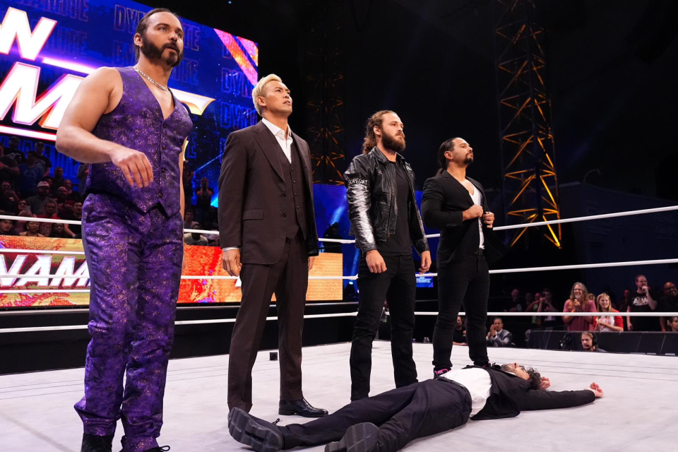 Matt Jackson, left, Kazuchika Okada, Jack Perry and Nick Jackson stand over AEW founder Tony Khan after the beat him up to end AEW Dynamite on Wednesday, April 25, 2024.