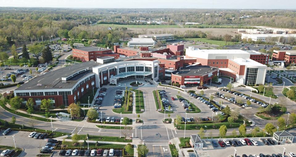 A man killed in an exchange of gunfire with law enforcement in the emergency room at Mt. Carmel St. Ann's Hospital, located at right in this April 2021 aerial photo of the hospital at 500 Cleveland Ave., killed a man with the same gun two days earlier, Columbus police announced Tuesday, Nov. 1, 2022.